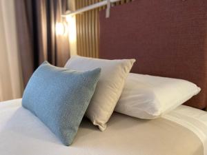Postel nebo postele na pokoji v ubytování Hotel Leonor Conil