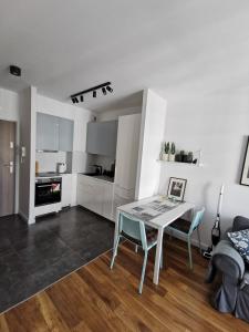 Kuchyňa alebo kuchynka v ubytovaní Apartament doris doris + 3 fotografie