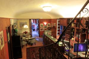 A television and/or entertainment centre at Felicin - Dimora del Centro