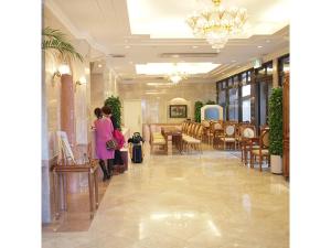 a rendering of the lobby of a hotel at Hotel Sun Queen - Vacation STAY 43433v in Naha +59 photos