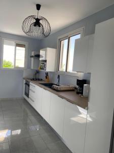 Kuchyň nebo kuchyňský kout v ubytování Villa de L'anse - bas de villa