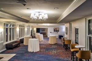 a banquet hall with tables and chairs and a room at Gettysburg Hotel in Gettysburg