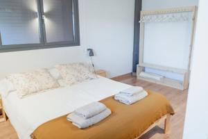 Postel nebo postele na pokoji v ubytování CASA LLOP a Paüls, Vall Fosca