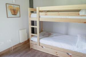 Postel nebo postele na pokoji v ubytování CASA LLOP a Paüls, Vall Fosca
