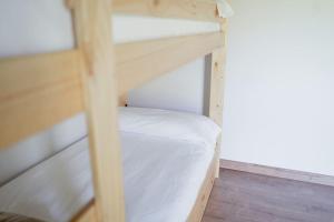 Postel nebo postele na pokoji v ubytování CASA LLOP a Paüls, Vall Fosca