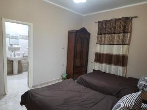 Letto o letti in una camera di Aton pyramids view guest house