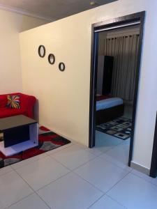 Letto o letti in una camera di Posh Hotel and Suites Victoria Island