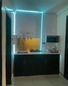 Cucina o angolo cottura di Posh Hotel and Suites Victoria Island