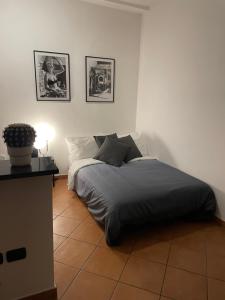 Posteľ alebo postele v izbe v ubytovaní MammaRo's House