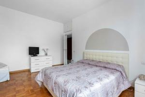 Giường trong phòng chung tại VIBE Apartment Rome