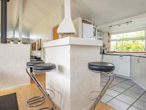 Kuchyň nebo kuchyňský kout v ubytování Luxury Retreat in Vejers - By Traum Ferienwohnungen