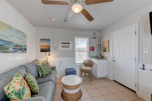 a living room with a couch and a ceiling fan at La Mansion SPV6 in Port Aransas