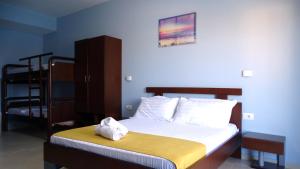 Postel nebo postele na pokoji v ubytování Hotel De Luna