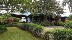 a white van parked outside of a house at Villa Azul 