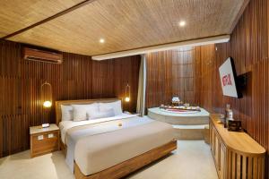 TV a/nebo společenská místnost v ubytování Sana Vie Villa Seminyak by Ini Vie Hospitality