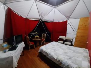 Postel nebo postele na pokoji v ubytování Glamping Mi Casita