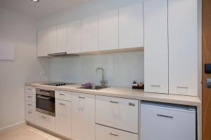 Kuchyň nebo kuchyňský kout v ubytování Resort Apartment 275 + 4 fotografie