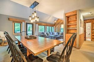 a dining room with a wooden table and chairs at Family-Friendly Stratton Gem Close to Slopes! in Stratton