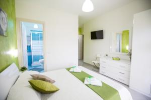 Postel nebo postele na pokoji v ubytování B&B Pepito