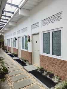 Zahrada ubytování Bu Sepuh GuestHouse