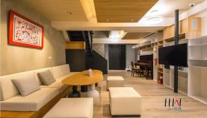 Lounge atau bar di Three Adds One Homestay