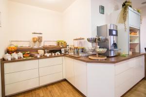 Küche/Küchenzeile in der Unterkunft Hotel Zlami-Holzer