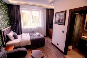 Postel nebo postele na pokoji v ubytování Hotel Yaman