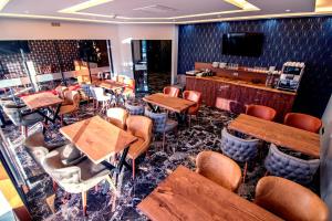 TV a/nebo společenská místnost v ubytování Hotel Yaman