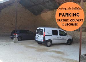 a white van parked in a parking garage at AU LOGIS DE BELLEFOIS - Chambres d'hôtes in Neuville-du-Poitou