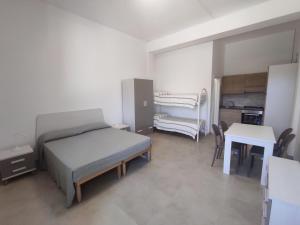 Postel nebo postele na pokoji v ubytování Masseria Carrozzi + 37 fotografií