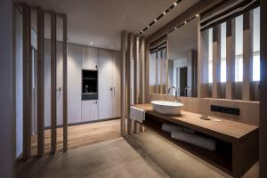 Ванная комната в ADLER Spa Resort SICILIA