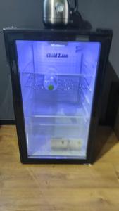 a glass box with a wii remote in it at stylish apartment by the SEA in Ashdod