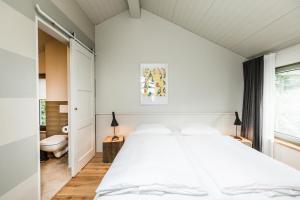 Postel nebo postele na pokoji v ubytování Im-Jaich Naturoase Gustow