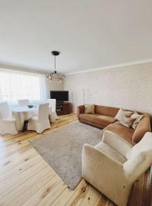 A seating area at 2-bedroom apt in Slupsk, your home away from home