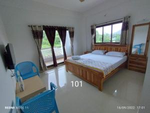 Hotel Kavijay Sea View客房内的一张或多张床位