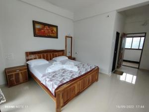 Hotel Kavijay Sea View客房内的一张或多张床位