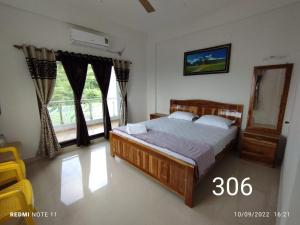 Hotel Kavijay Sea View客房内的一张或多张床位