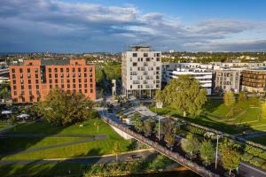 an aerial view of a city with tall buildings at Jugendherberge Heilbronn in Heilbronn +16 photos