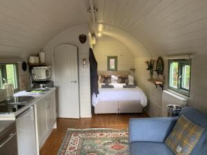 a bedroom with a bed in a small room at Suilven view in Lochinver