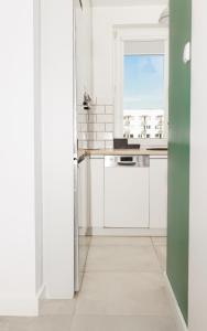 Kuchyňa alebo kuchynka v ubytovaní Apartament Nadmorski + 7 fotografií