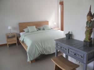 Llit o llits en una habitació de Ju'Blu Hotel