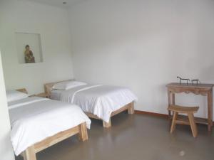 Llit o llits en una habitació de Ju'Blu Hotel