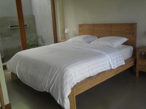 Llit o llits en una habitació de Ju'Blu Hotel