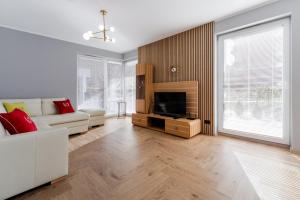 Televízia a/alebo spoločenská miestnosť v ubytovaní Apartamenty Gdansk EU - Angielska Grobla OLD TOWN Gdańsk Apartament - z 2 sypialniami - Stylowy