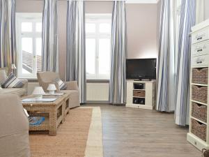 TV a/nebo společenská místnost v ubytování Villa Fernsicht - Apt. 08 + 10 fotografií