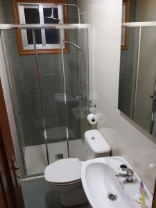 Koupelna v ubytování Apartamento con terraza y vistas al mar