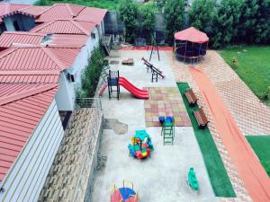 an aerial view of a playground with a play set at HOTEL RAJWADA RESORT in Raipur