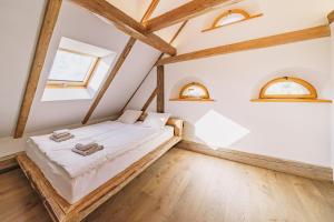 Postel nebo postele na pokoji v ubytování Kamenka U Babi + 28 fotografií