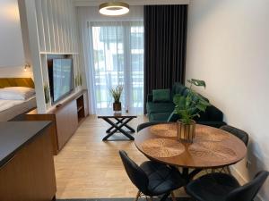 Posteľ alebo postele v izbe v ubytovaní APARTAMENTY SKORUPKI-Mazury Mikołajki