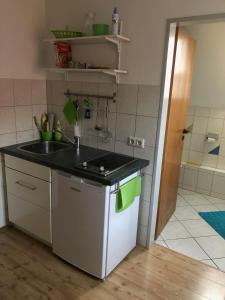 Kuchyň nebo kuchyňský kout v ubytování Ferienwohnung Briechle + 9 fotografií